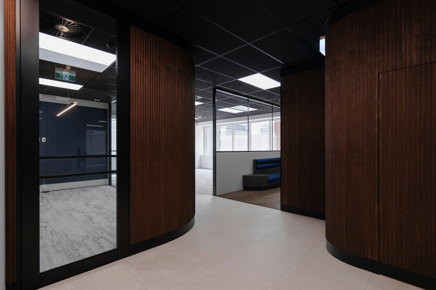 Modern office interior with curved wooden walls