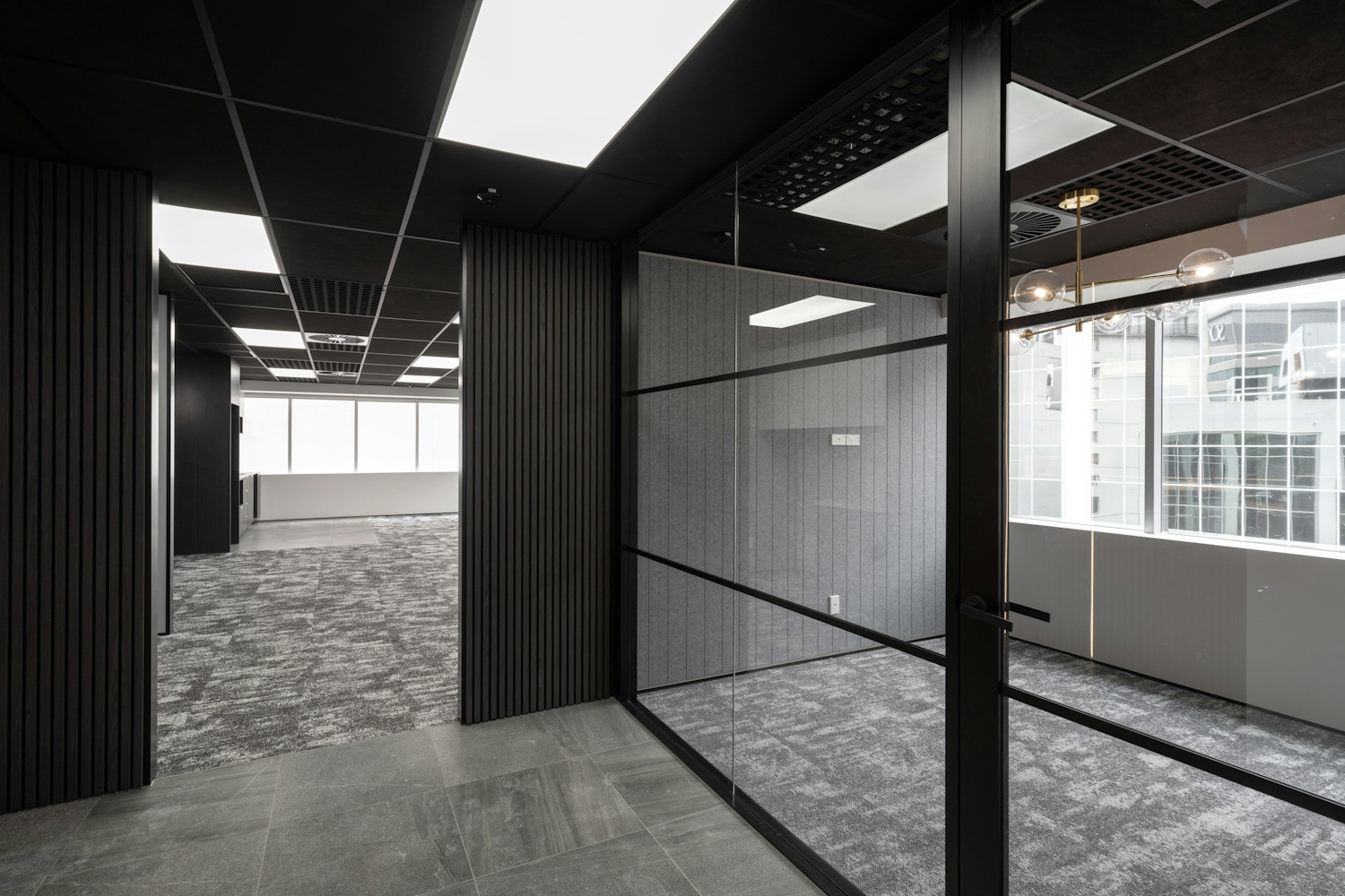 Modern empty office with glass walls and carpet