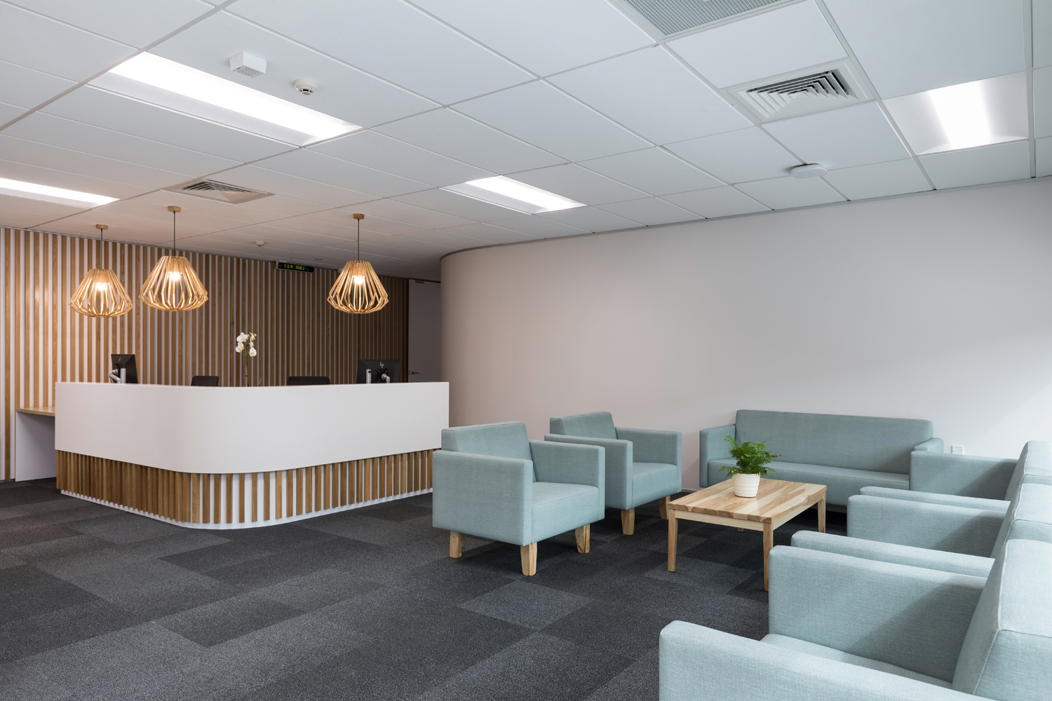 Modern office reception with seating area