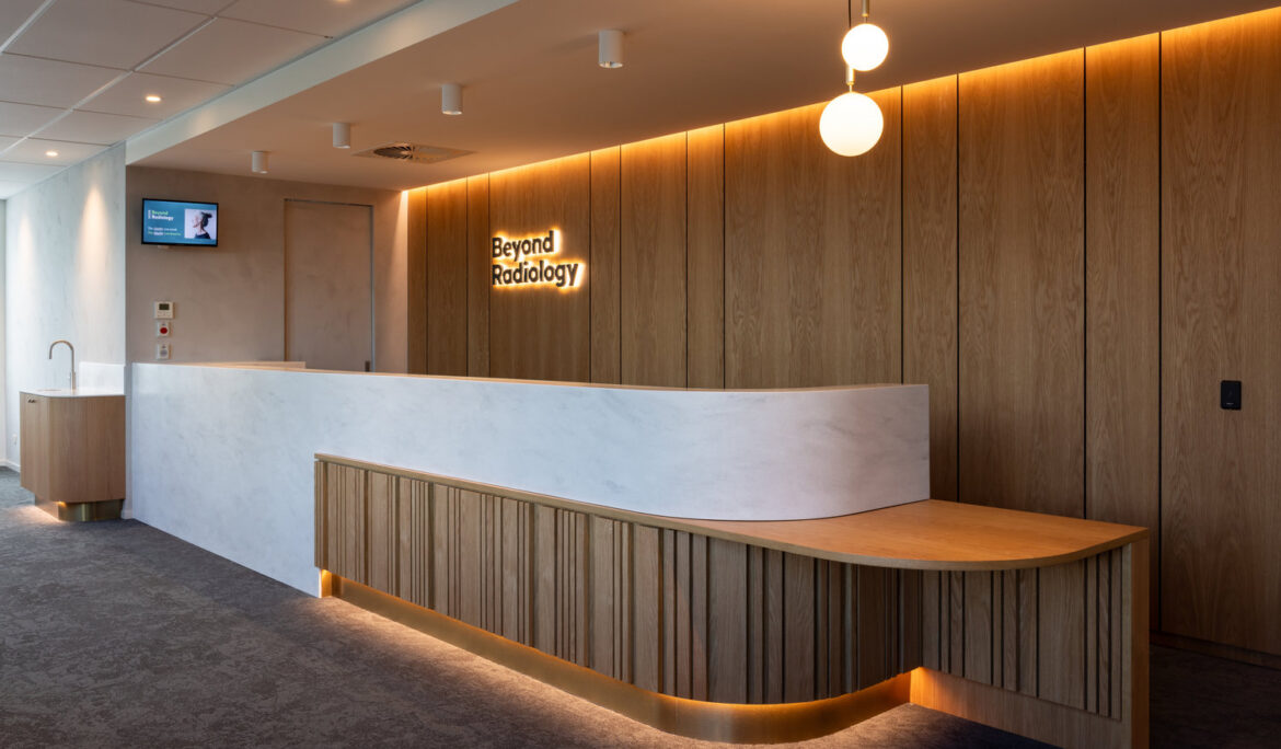Modern radiology clinic reception with wooden design