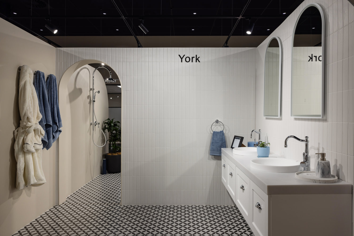 Modern bathroom with shower and double vanity sinks