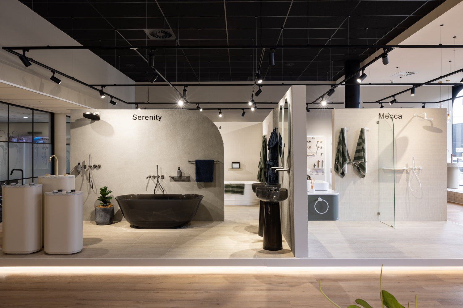 Modern bathroom showroom with bathtubs and showers