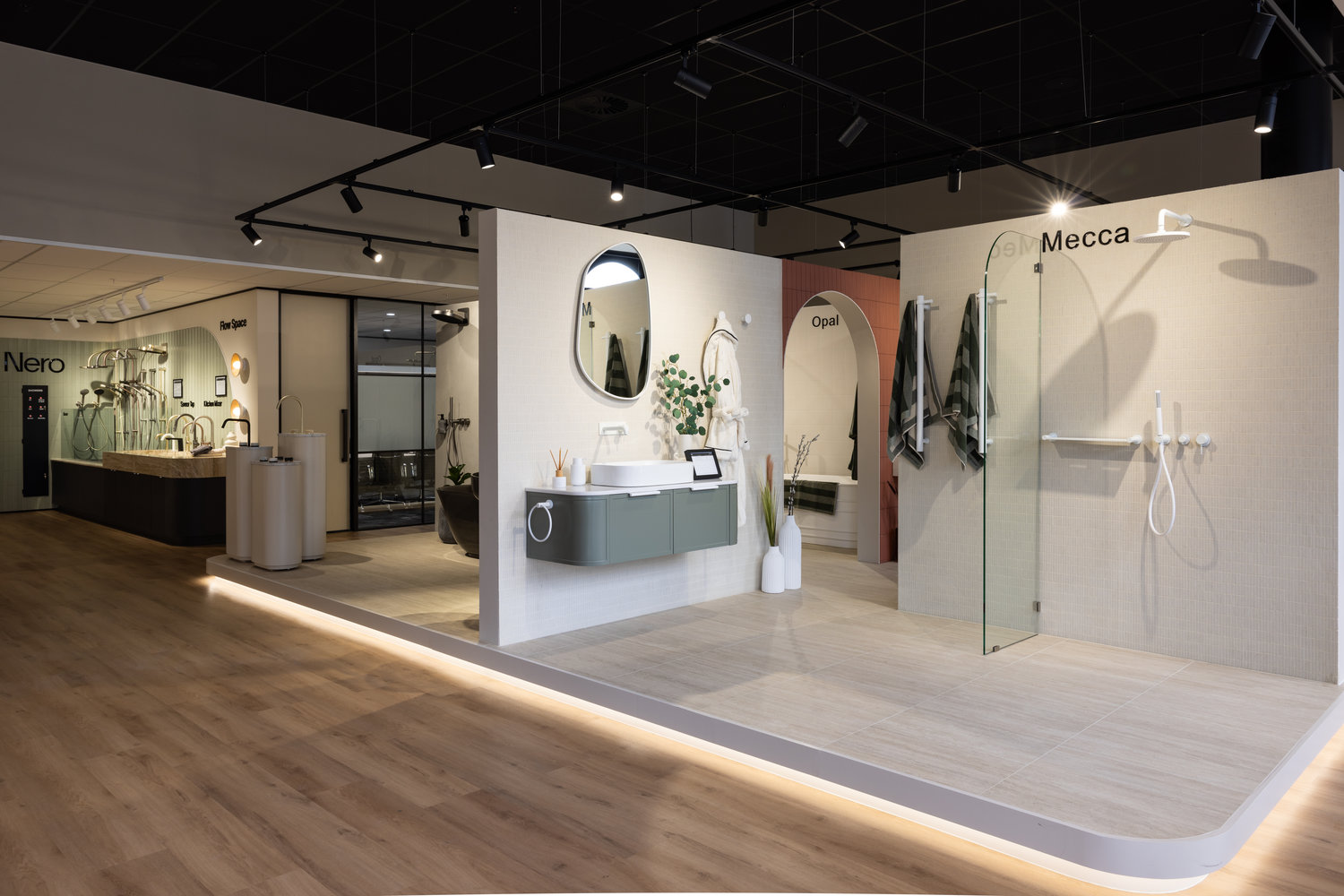Modern bathroom showroom with sinks and showers