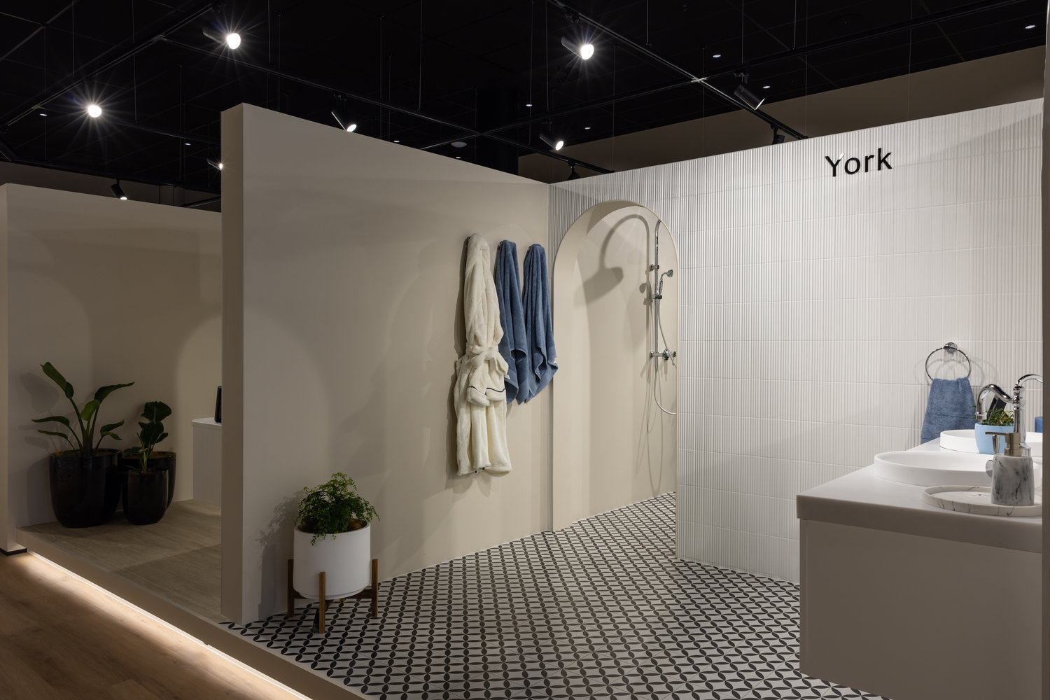 Modern bathroom with shower and stylish tiles