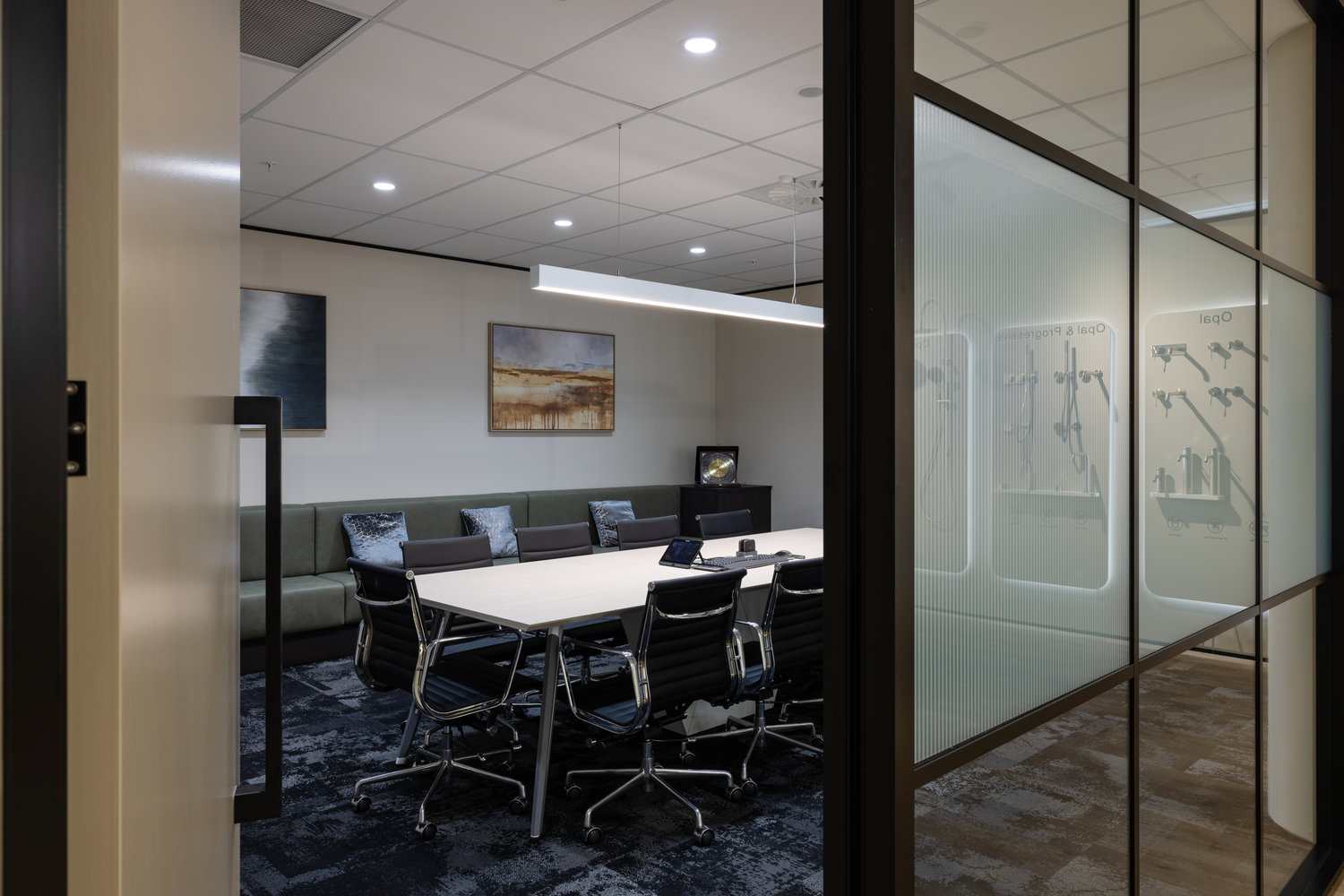 Modern office meeting room with table and chairs