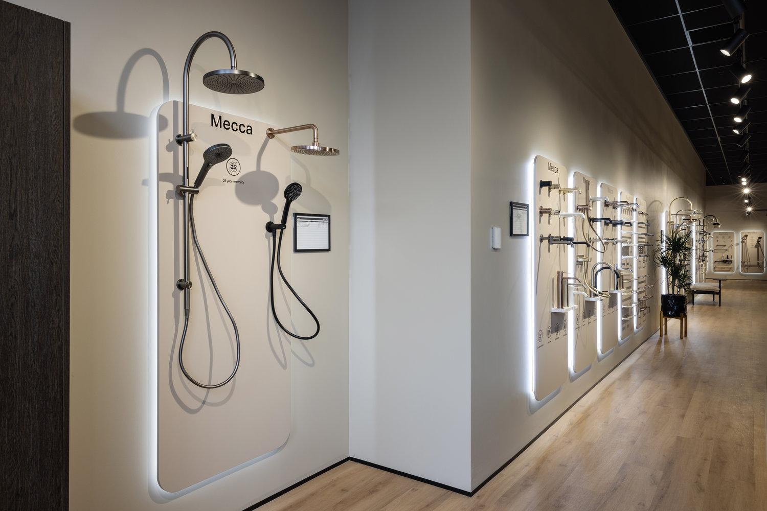 Modern bathroom showroom displaying shower fixtures