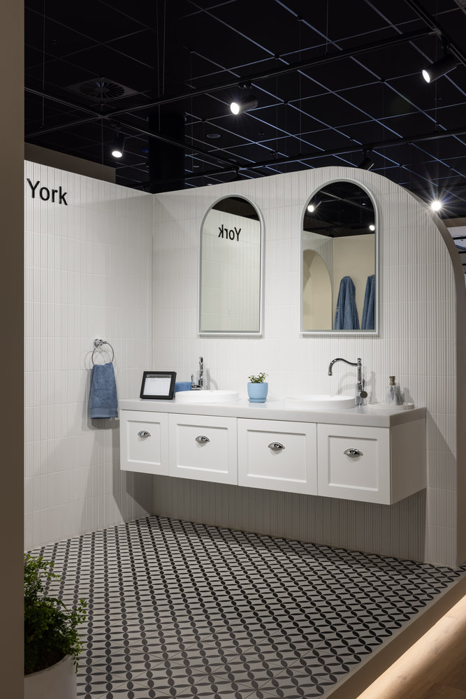 Modern bathroom with double sink and patterned tiles