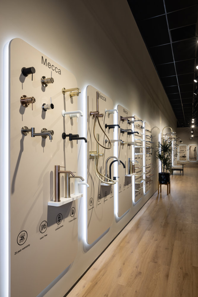 Modern showroom displaying Mecca taps and bathroom fixtures
